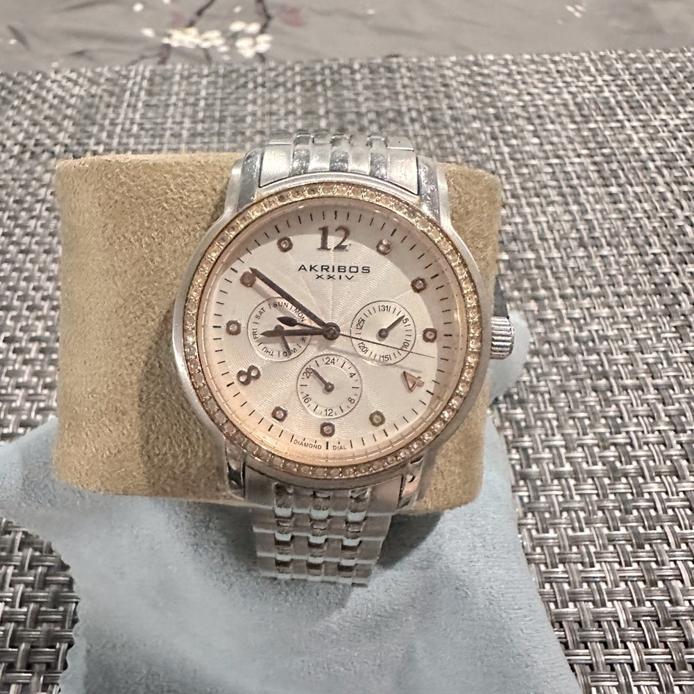 AKRIBOS XXIV Ladies oversized light pink face. Dial has pink zirconias around it